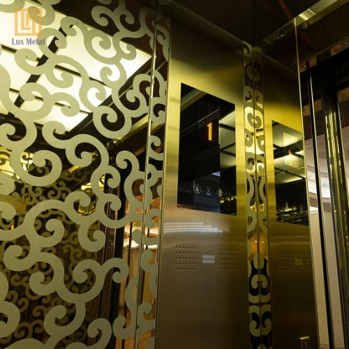 Tấm Inox Vàng Gương Cabin thang máy ốp tấm inox vàng gương sang trọng