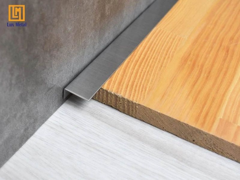 Nẹp Inox Sàn Gỗ Nẹp inox kết thúc sàn gỗ che khe nối giữa sàn gỗ và tường