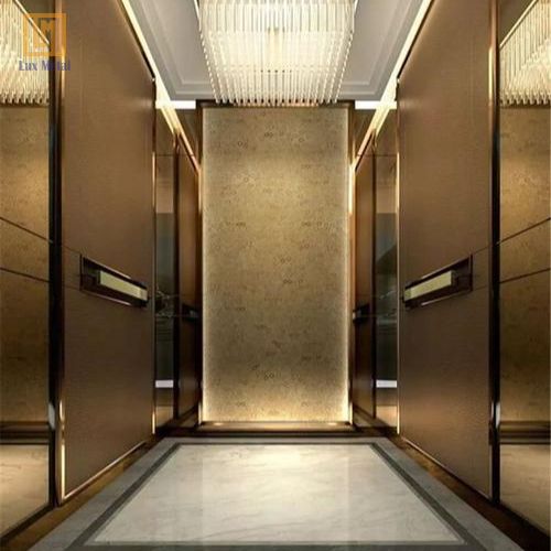 Tấm Inox Gương Đồng Tấm inox gương đồng ứng dụng trong trang trí và bảo vệ cabin thang máy