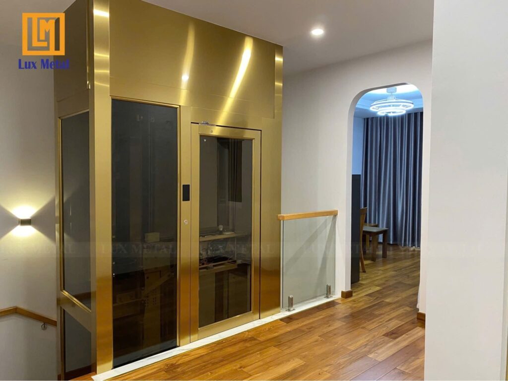 Ốp inox thang máy mạ vàng