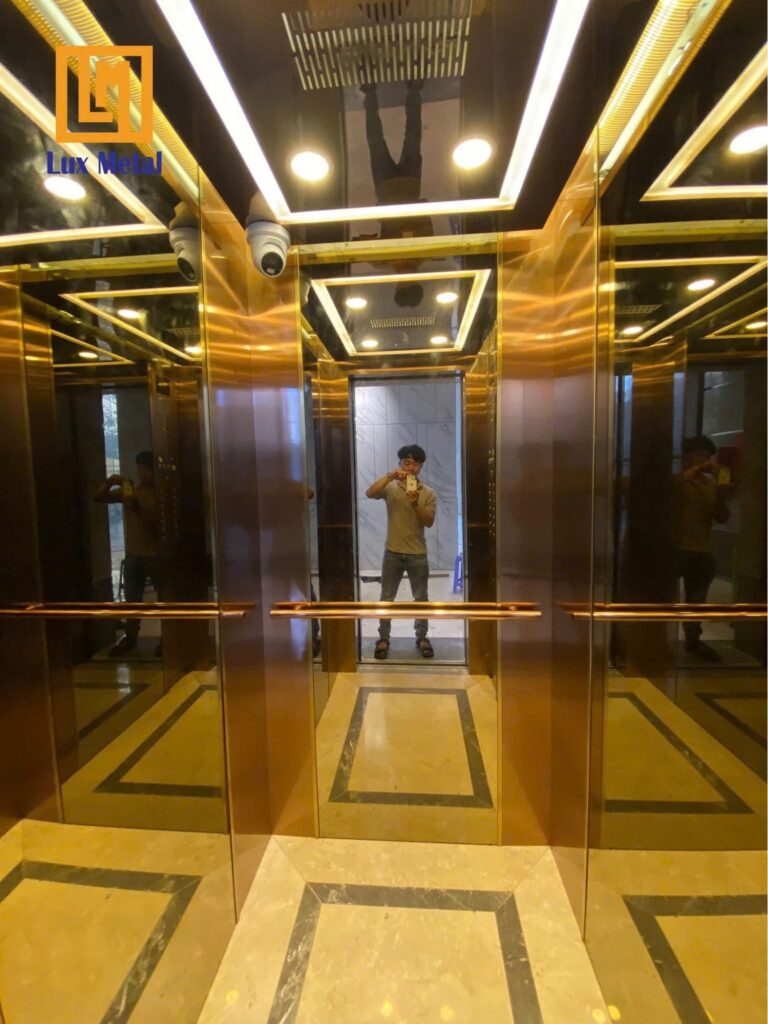 Cabin thang máy inox mạ vàng